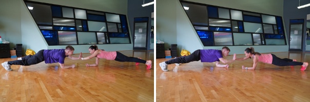 high-five plank with partner in gym workout