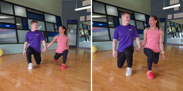 partner lunges workout in gym