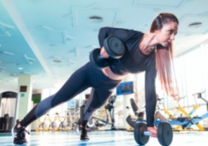 woman weight lifting in gym