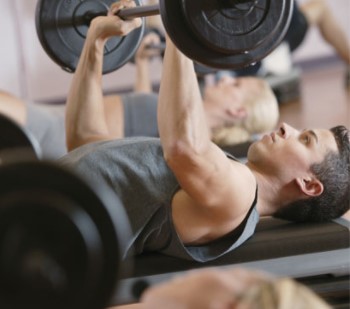 guy lifting weights in the gym