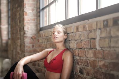woman tired after intense gym workout