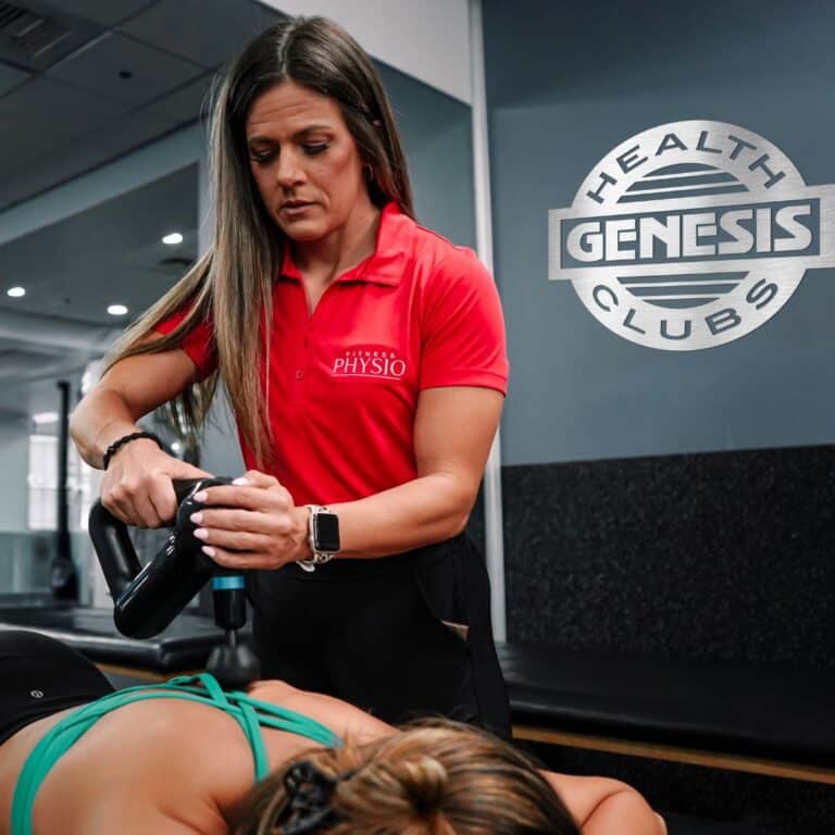 Fitness Physio therapist discussing treatment with a patient