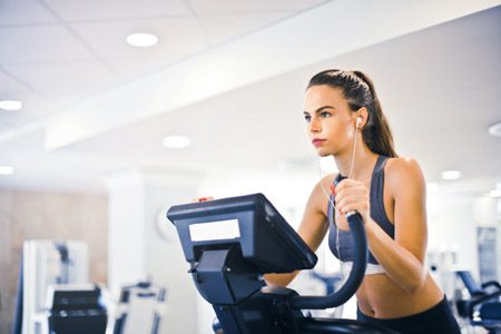 young female on treadmill